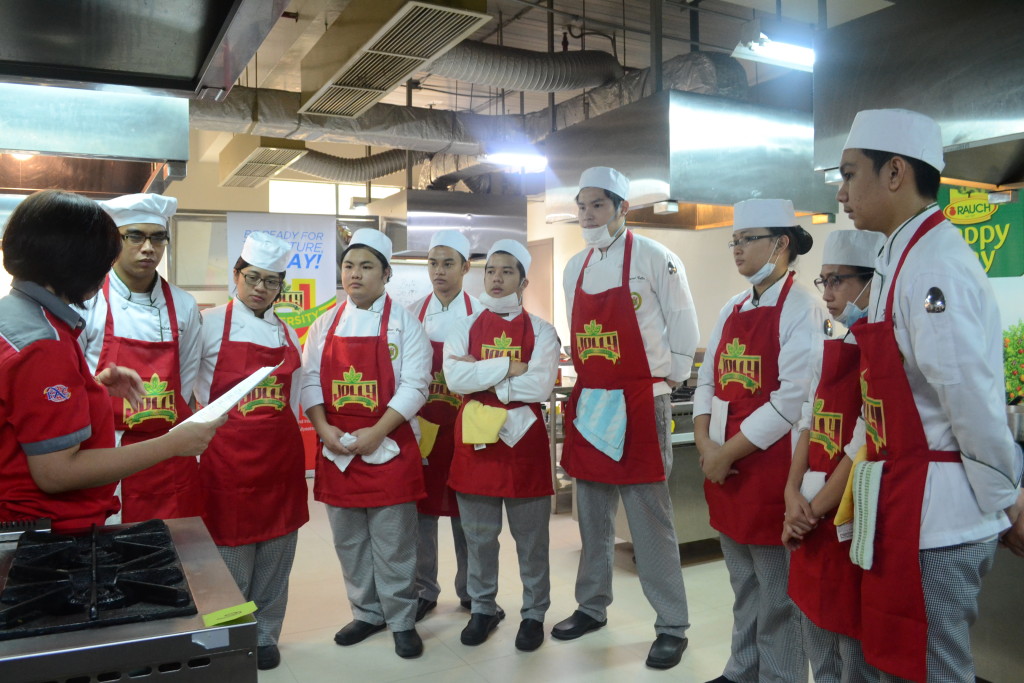 One of the Jolly University Mentors conducting the hands     on training in kitchen skills