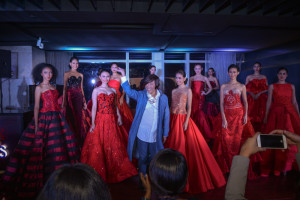 Filipino designer Renee Salud and models wearing his creations