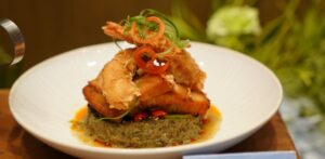 Laing with crispy pork belly